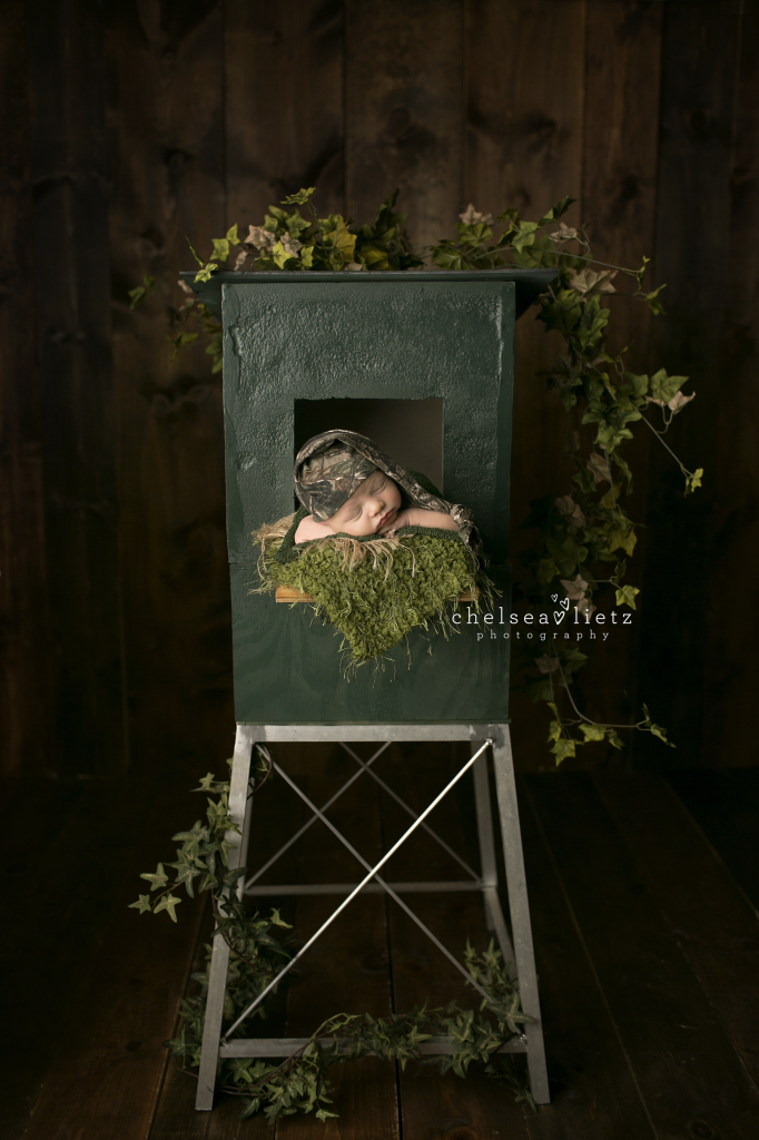 baby photo in hunting blind by San Antonio photographer